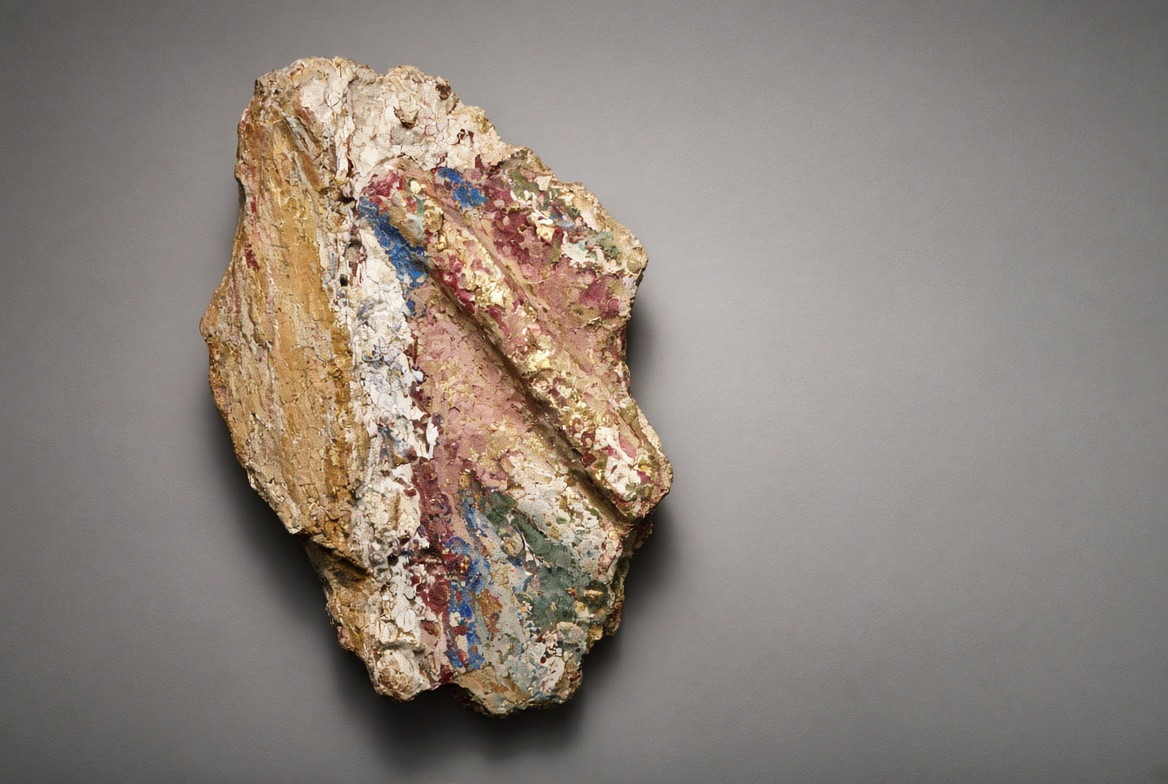 Pale gesso visible between color and support